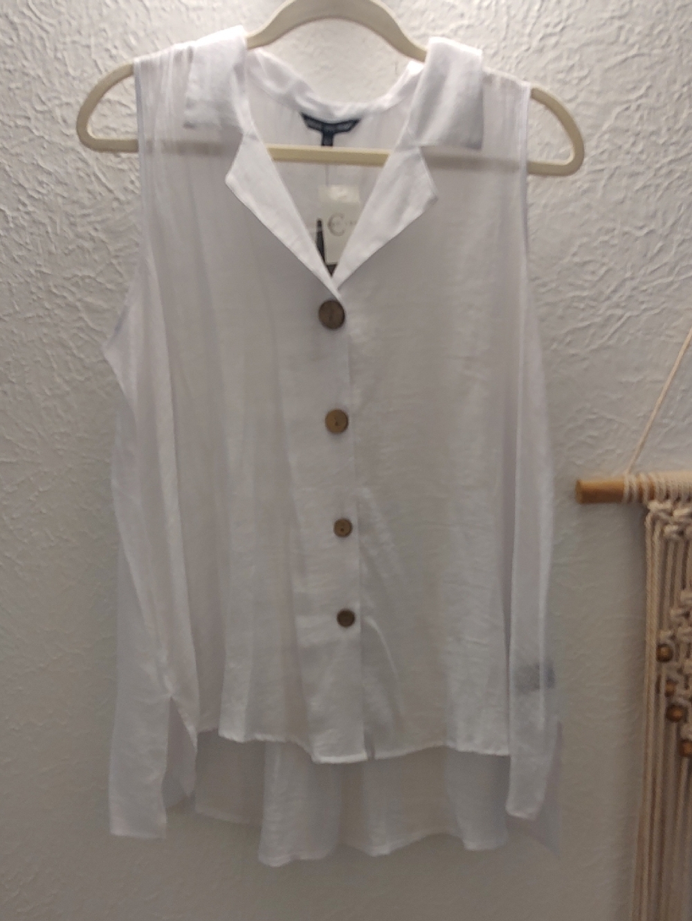 Unique Spectrum Sleeveless White Button-Front Blouse